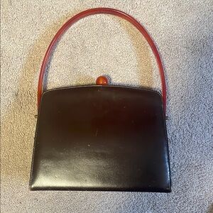 Elegant Black and Red Handbag